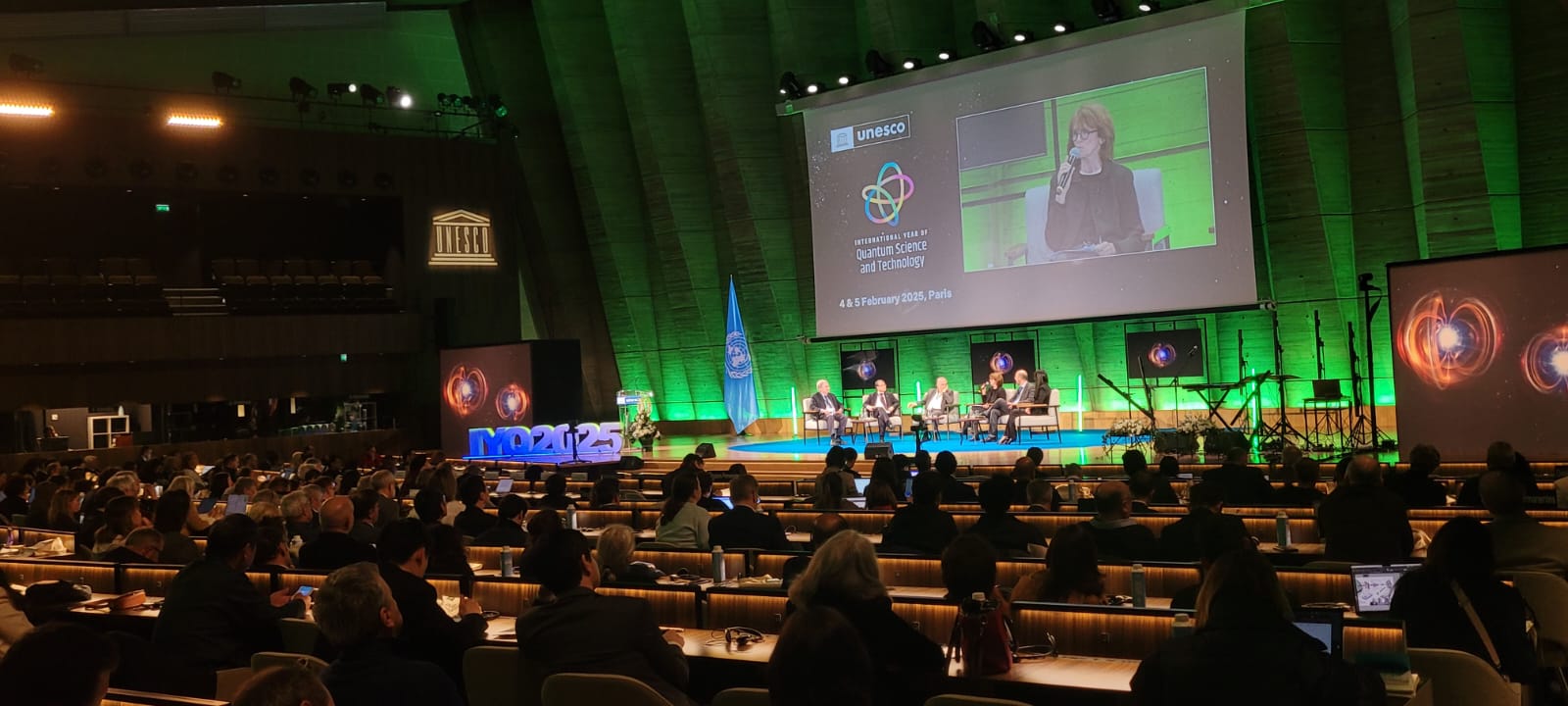 Cathy Foley on stage with panel